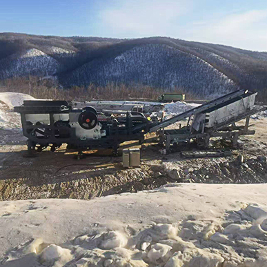 Crushing Line On-Site View displays the live, integrated operation of crushing, screening, and conveying machinery converting raw rocks into processed aggregates in an active mining or quarry environment.